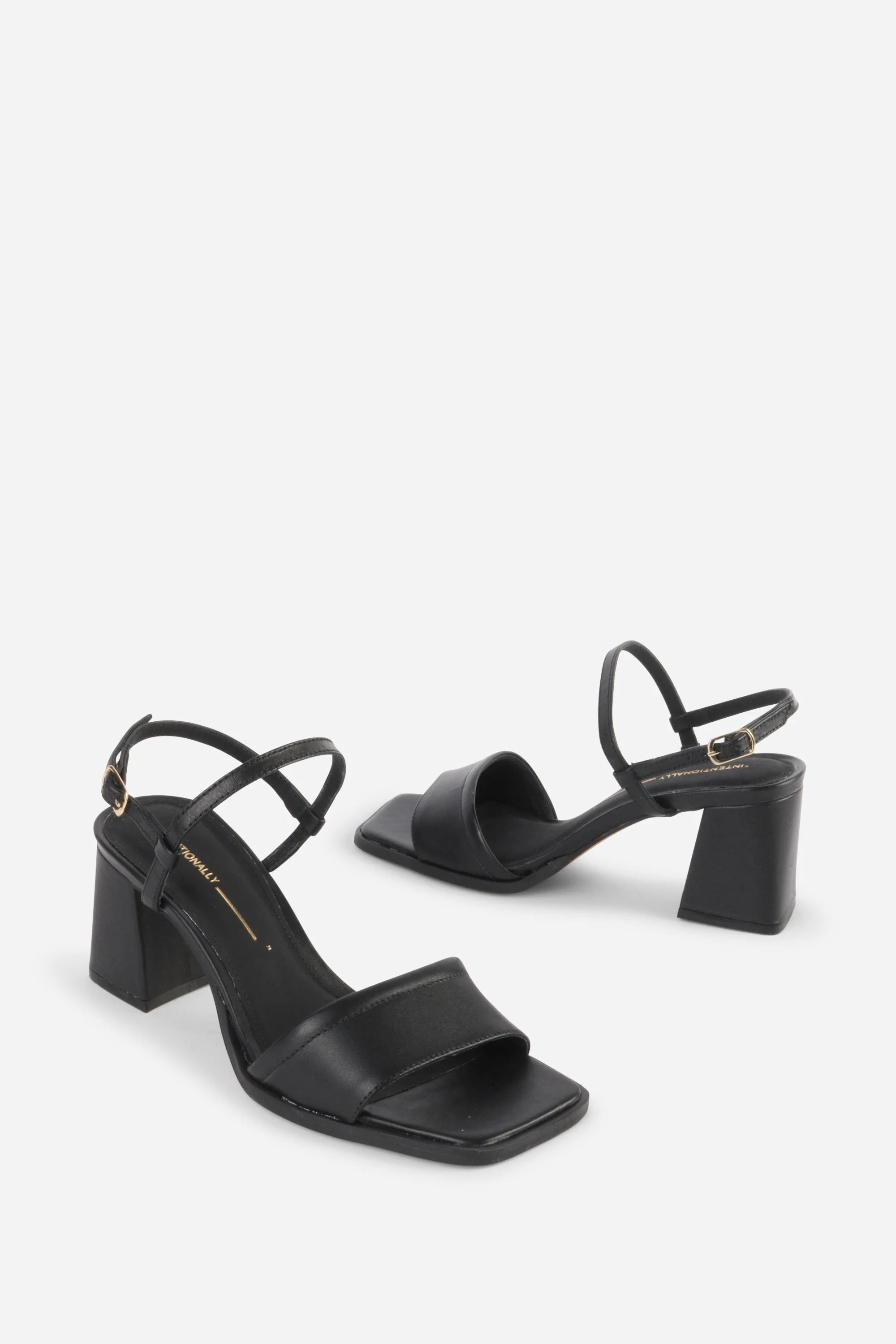 "INTENTIONALLY __________." VALIDATED LEATHER HEEL - Black - Image 3