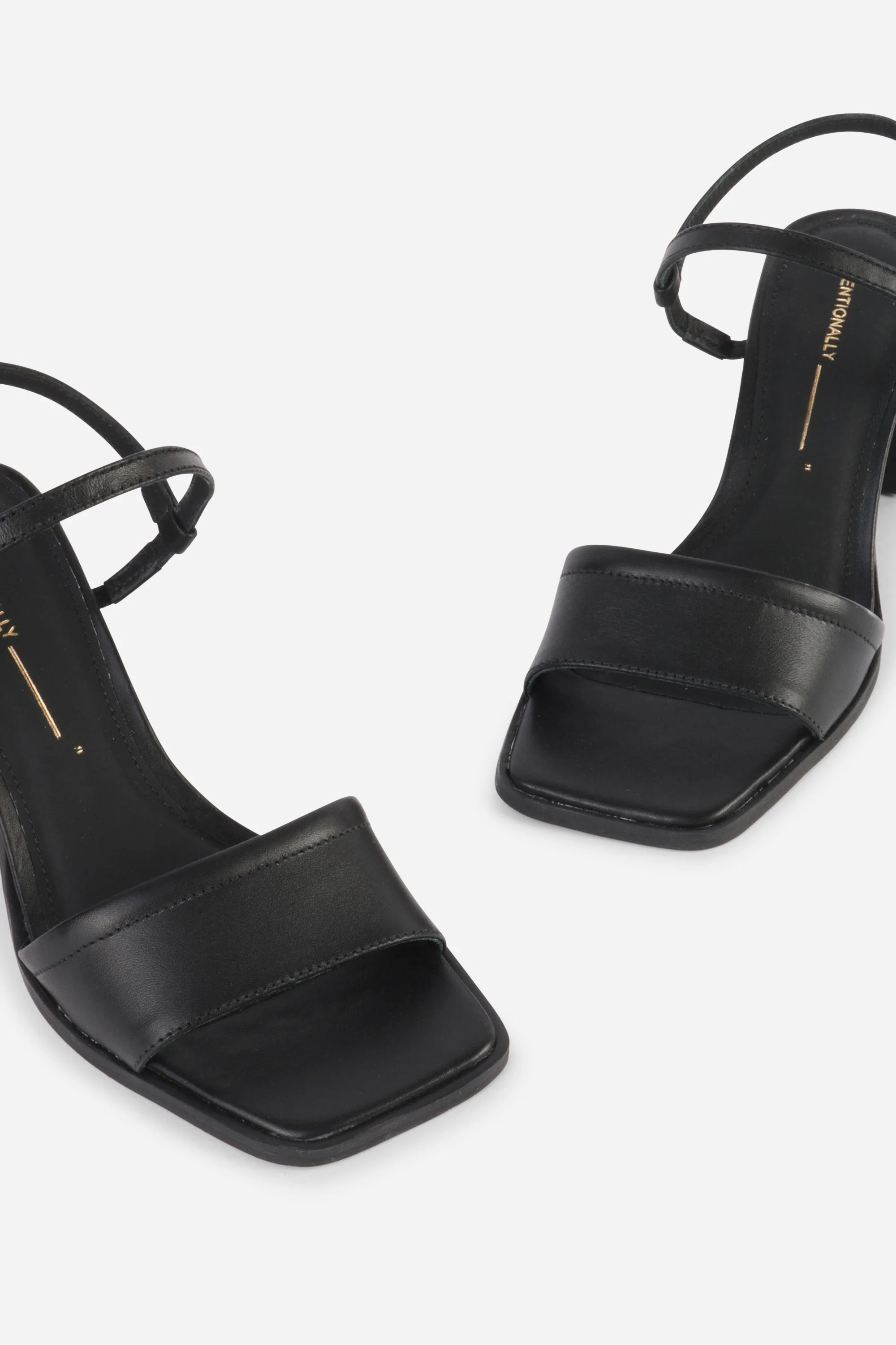 "INTENTIONALLY __________." VALIDATED LEATHER HEEL - Black - Image 4