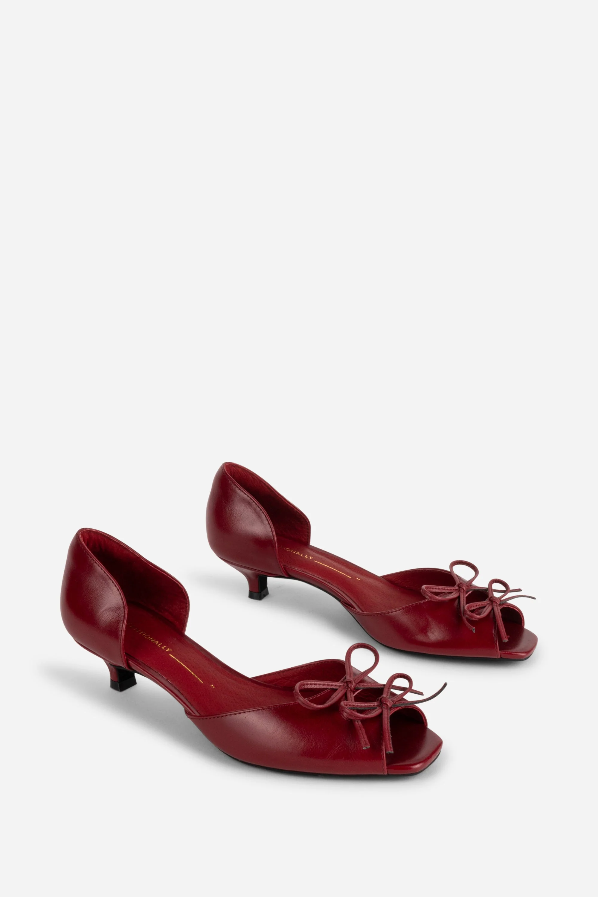 "INTENTIONALLY __________." Carol Peep Toe Kitten Heel