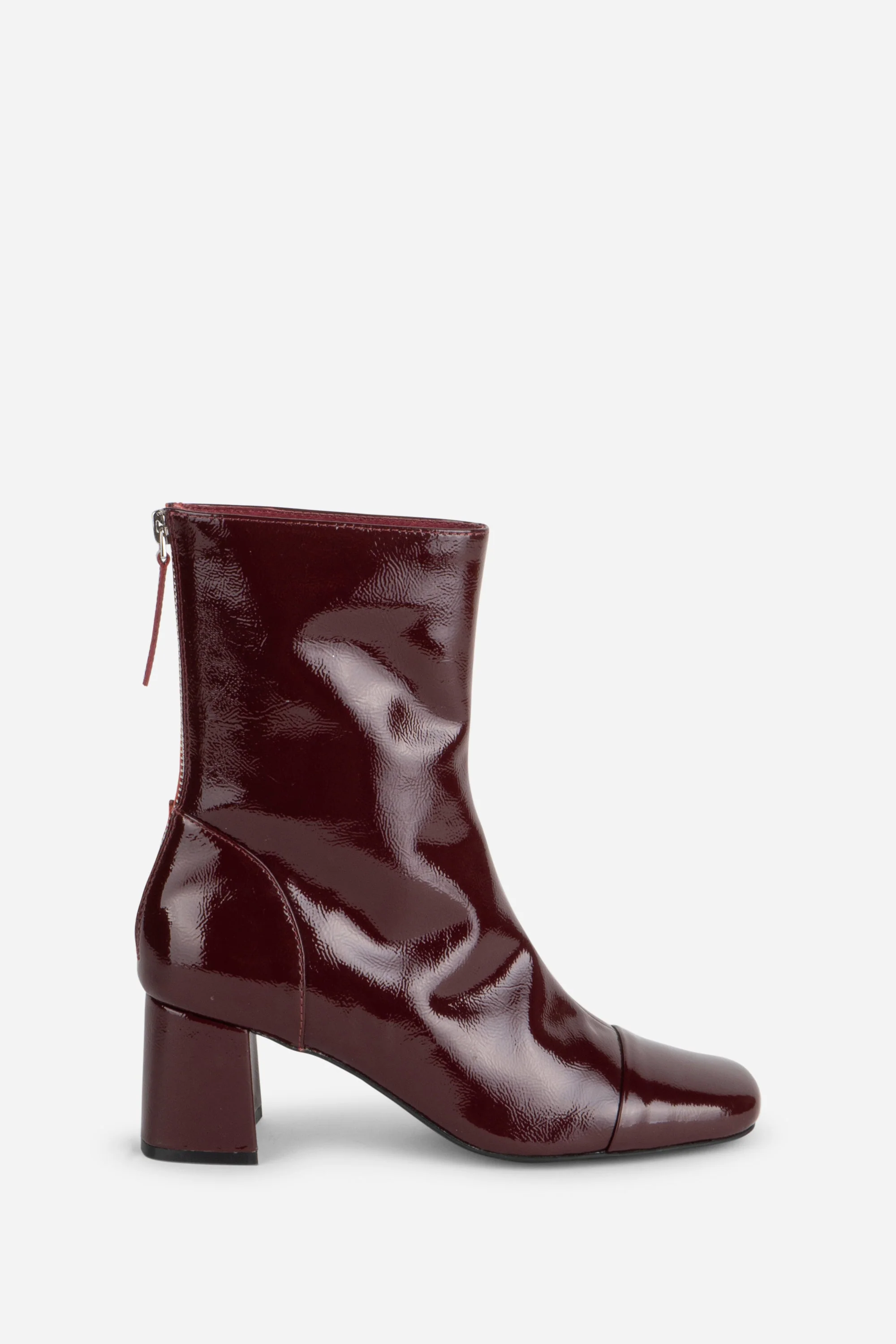 INTENTIONALLY __________. Mila Patent Leather Ankle Boot - Image 6